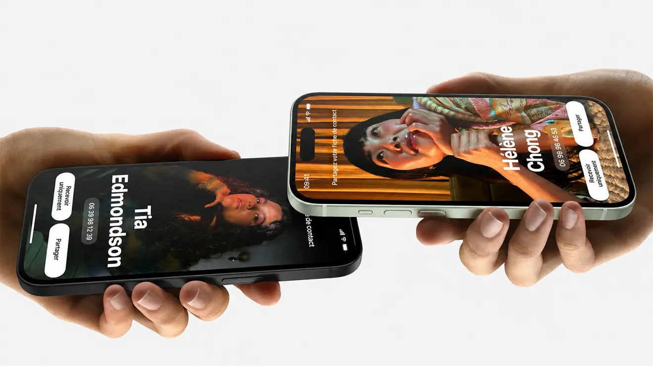Deux iPhone rapprochés affichant l'interface NameDrop avant validation du partage de coordonnées